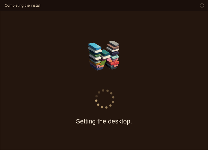 Completing the install. The WASD logo is above a ring of dots, and the line says Setting the desktop.